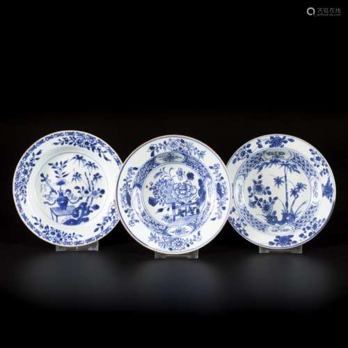 A lot comprising (3) porcelain porridge plates with floral d...