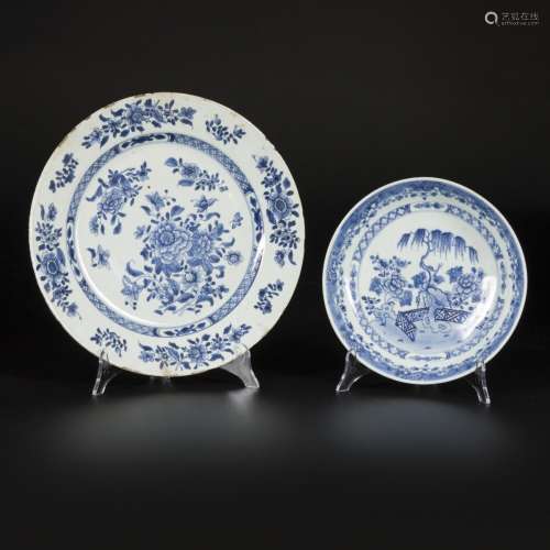 A lot comprising a porcelain plate and saucer with floral de...