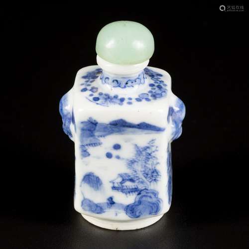 A porcelain snuff bottle with landscape decoration, marked L...