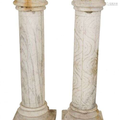 A set of (2) marble columns.