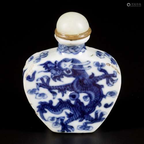 A porcelain snuff bottle with dragon decoration, China, Daog...