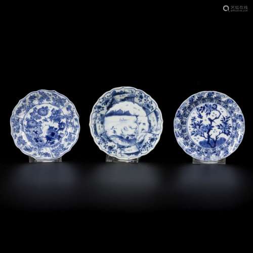 A lot comprising (3) contoured porcelain plates, two with fl...