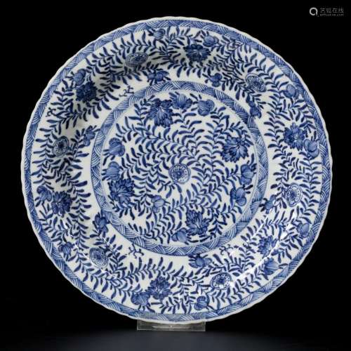 A porcelain ribbed charger with floral decoration, China, Ka...