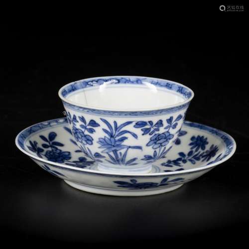 A porcelain cup and saucer with floral decorations and 6-cha...
