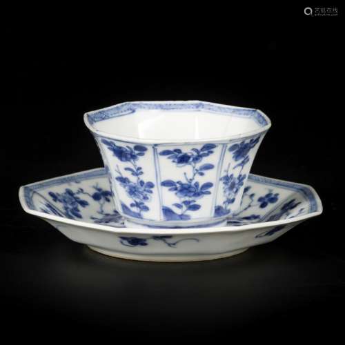 A porcelain cup and saucer, angled model with floral decorat...