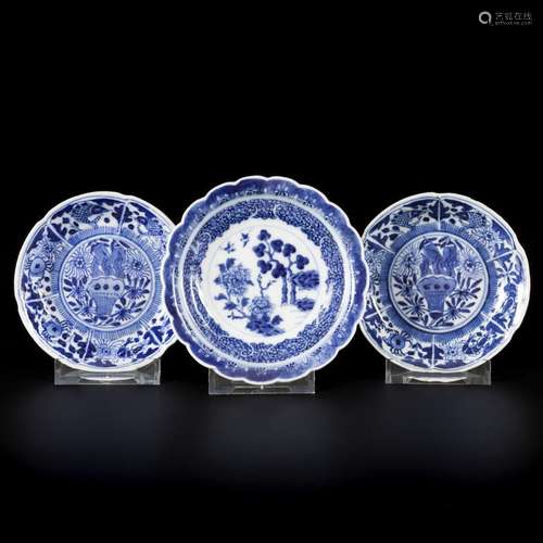 A lot comprising (3) porcelain plates with floral decoration...