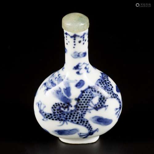 A porcelain snuff bottle with dragon decoration, China, 19th...