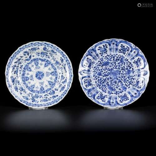 A lot comprised of (2) porcelain plates with floral decorati...