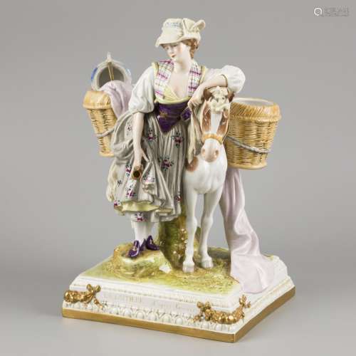 A porcelain group of a milkmaid and mule. 