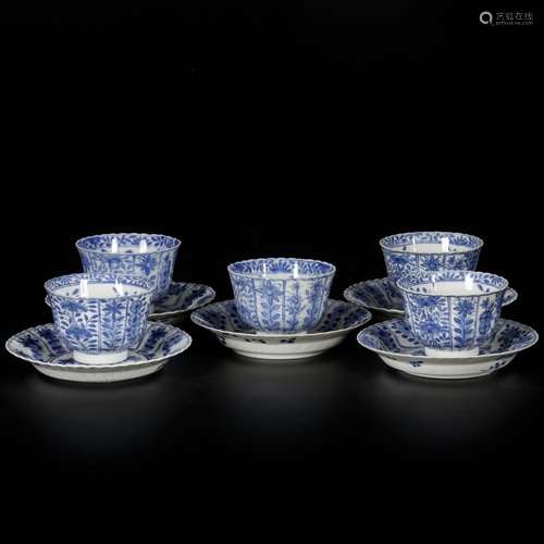 A set of (5) porcelain cups and saucers with floral decor, m...