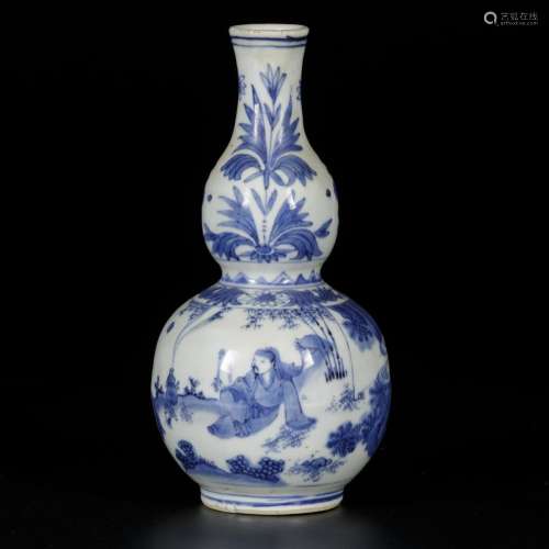 A porcelain gourd-shaped vase with decor of figures in garde...