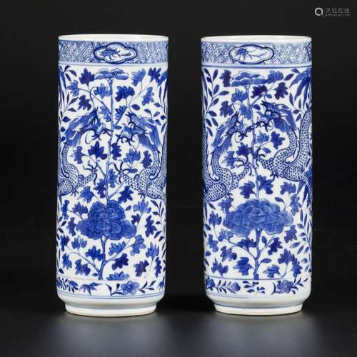 A set of (2) porcelain cylinder vases with dragon decoration...