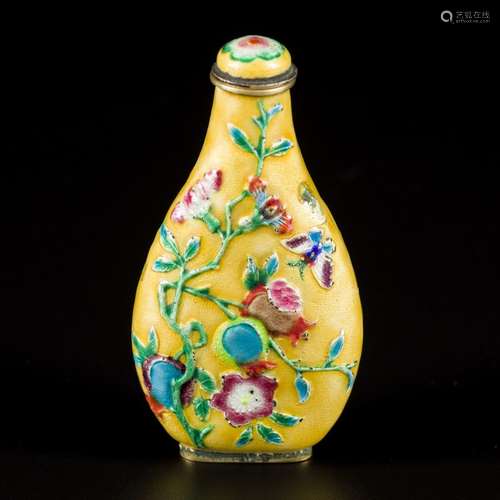 An enamel snuff bottle decorated with flowers and birds, Chi...