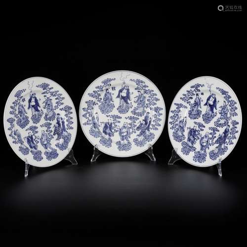 A set of (3) porcelain plates decorated with immortals, mark...