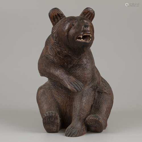 A 'Black Forrest' oak sculture of a bear, Southern Germany, ...