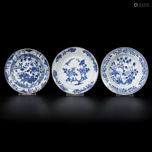 A lot comprised of (3) porcelain plates with floral decorati...