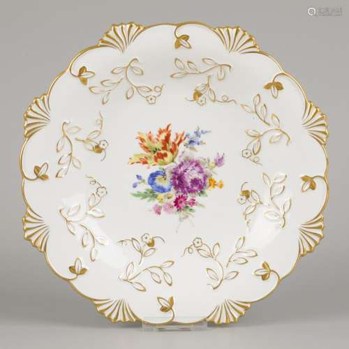 A porcelain dish decorated with flowers and gilded motifs, M...