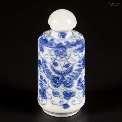 A softpaste snuff bottle decorated with butterflies and flow...