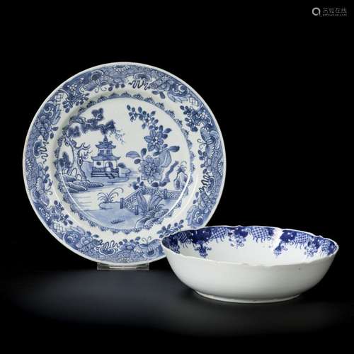 A porcelain colander plate and a porcelain plate with landsc...