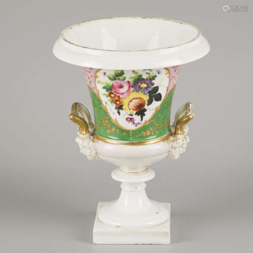 A porcelain ornamental vase decorated with flowers, France, ...