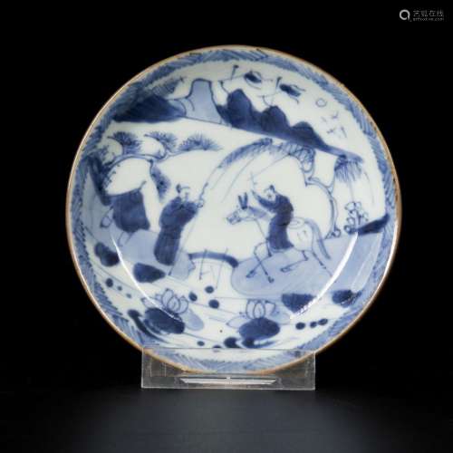 A porcelain plate decorated with figures in a landscape, Chi...