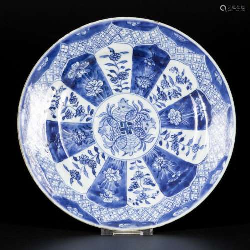 A porcelain plate with lotus leaf decor, pomegranate decor i...
