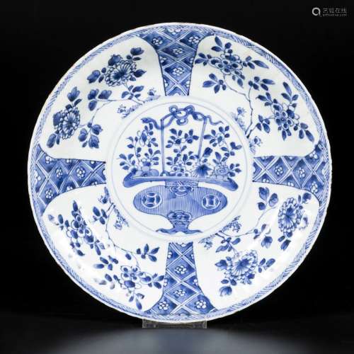 A porcelain charger with ribbed model with floral design, ha...