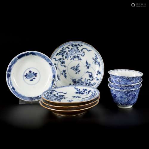 A lot comprised of (4) porcelain plates floral decoration wi...