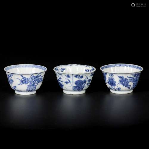 A lot of (3) porcelain cups, two with floral decoration and ...