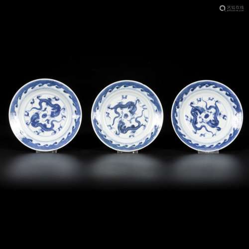 A set of (3) porcelain plates with dragon/flaming pearl deco...