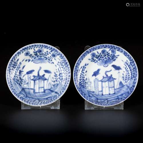 A set of (2) porcelain plates with cuckoo and house decorati...