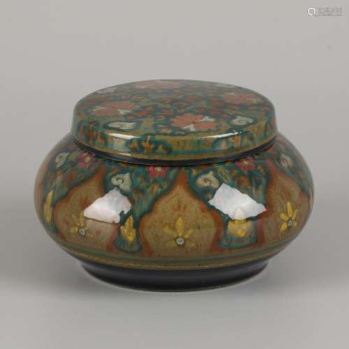 A Gouda earthenware lidded box with floral decoration, model...