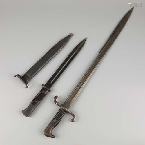 A lot comprised of (2) various German WOII bayonets, 1st hal...