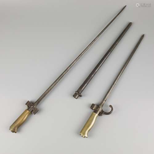 A lot comprised of (2) French Spike Bayonets, WWI, 1st quart...