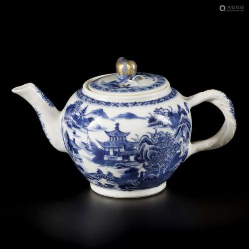 A porcelain teapot with river landscape and pagoda decor, wi...