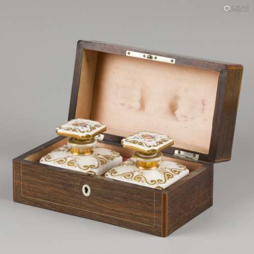 A fruitwood veneered tea caddy, the interior with porcelain ...