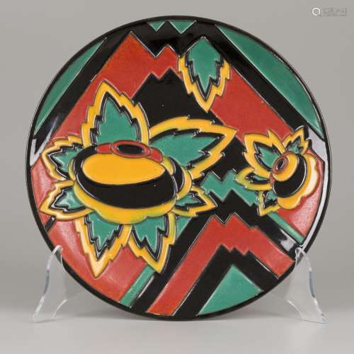 An earthenware wall plate with cloisonné decoration, design ...