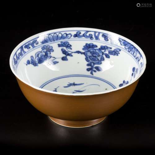 A porcelain bowl with capuchin exterior and floral decoratio...
