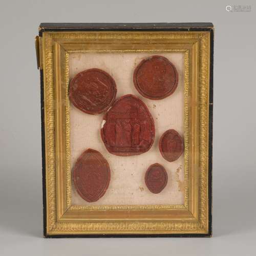 A set of (6) various laquer wax seals in Empire-style frame,...