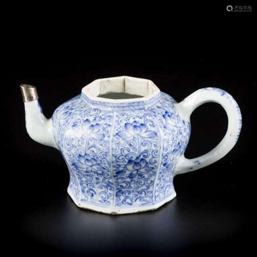 A porcelain teapot with floral decoration in compartments, C...