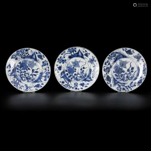 A set of (3) porcelain plates with floral and rock decoratio...