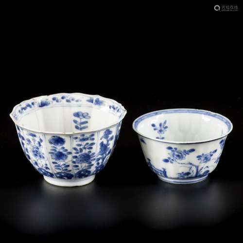 A lot comprised of (2) porcelain cups with floral decoration...