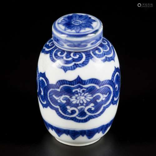 A porcelain lidded jar with floral decoration, marked Yu 