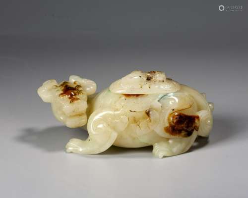 A Chinese White And Grey Jade Figure Of Mythical