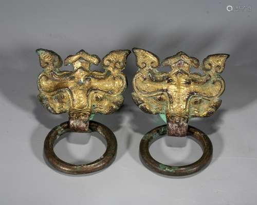 A Chinese Gilt-Bronze Animal Head Applique Holding