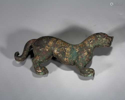 A Chinese Gold And Silver-Inlaid Bronze Tiger,Warring