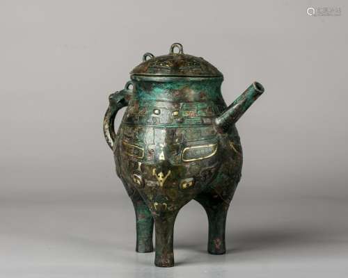 A Chinese Gold And Silver-Inlaid Bronze Ritual Ewer And
