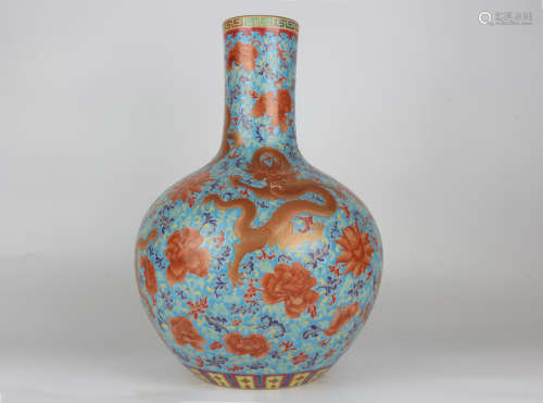 A QianLength enamelled dragon vase with gold-painted sky sph...