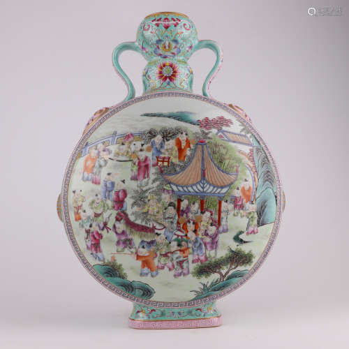 A QianLength famille-rose enamelled vase with two ears and a...