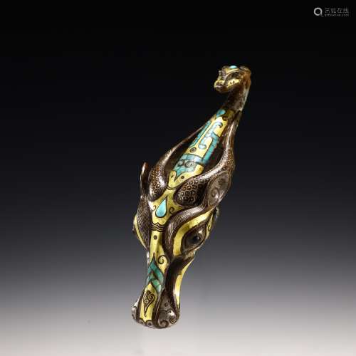 Ancient bronze inlaying gold and silver with stone animal he...
